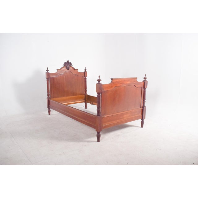 This Portuguese single bed is crafted in light wood and distinguished by its elegant proportions and refined details. The...