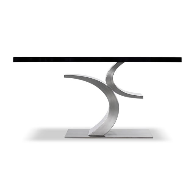 Modern Stainless Steel and black Lacquer console table designed by Greg Sheres. This is our “Cosmopolitan” console table....