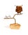 A small but sweet table top sculpture by C. Jere circa 1967. Made of brass with enamel eyes and installed on a natural...