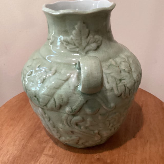 Chinese Vintage Celadon Glaze Crackle Finish With Handles Raised Floral Pattern Porcelain Vase For Sale - Image 3 of 12