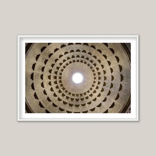 The oculus of the Pantheon in Rome, photographed from below, reveals the precision and extraordinary craftsmanship of a...