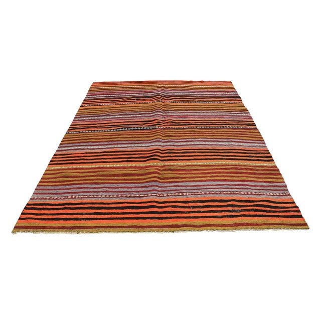 Handwoven vintage striped kilim rug from Denizli region of Turkey. Approximatelly 45-55 years old. In very good condition.