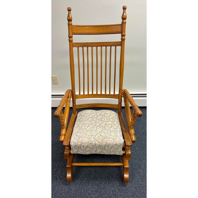 Late 19th century spindle back Victorian platform rocker. Made of maple with its original working spring rocking...