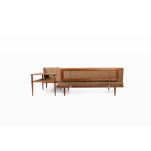An elegant minerva seating group, designed by peter hvidt & orla mølgaard-nielsen and manufactured by france & daverkosen...