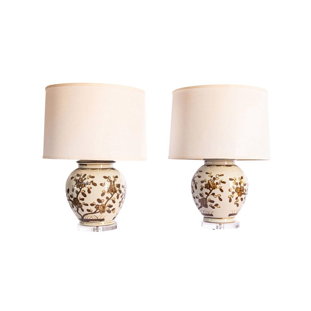 Chinese Hand Painted Brown and White Ginger Jar Lamps, a pair. Custom made with lucite bases and dark brass metal caps....