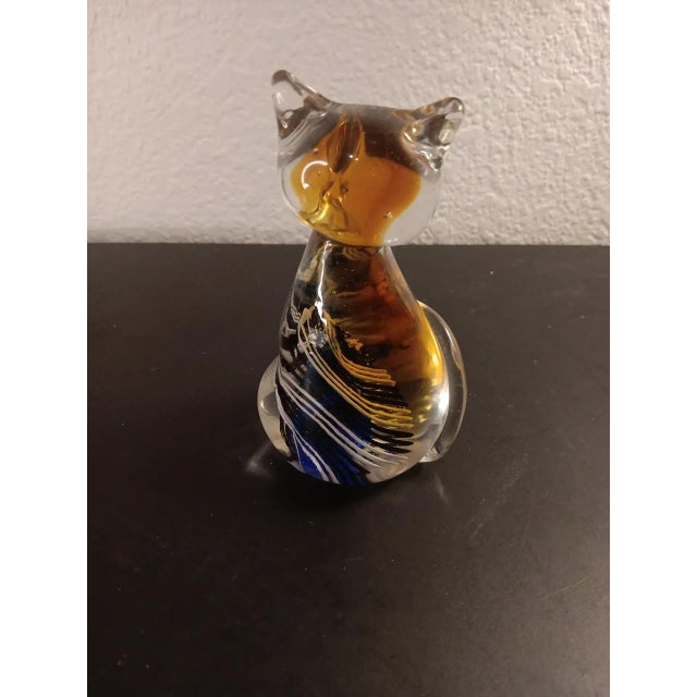 GORGEOUS Murano Style Amber w/ Blue & White Swirl Art Glass 4.5" Cat Figurine. This stunning art glass figurine features a...
