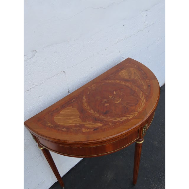 This Console Table / Game Table is made of wood, solid wood, veneer, and leather. This wonderful Table was made in the...