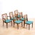 This stunning set of six dining chairs were designed by G Plan during the 1970s. Produced in afromosia with teal freshly...