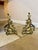 Large pair of antique French brass rococo fire dogs, having a quality large pair of French brass Rococo andiron Chenets of...