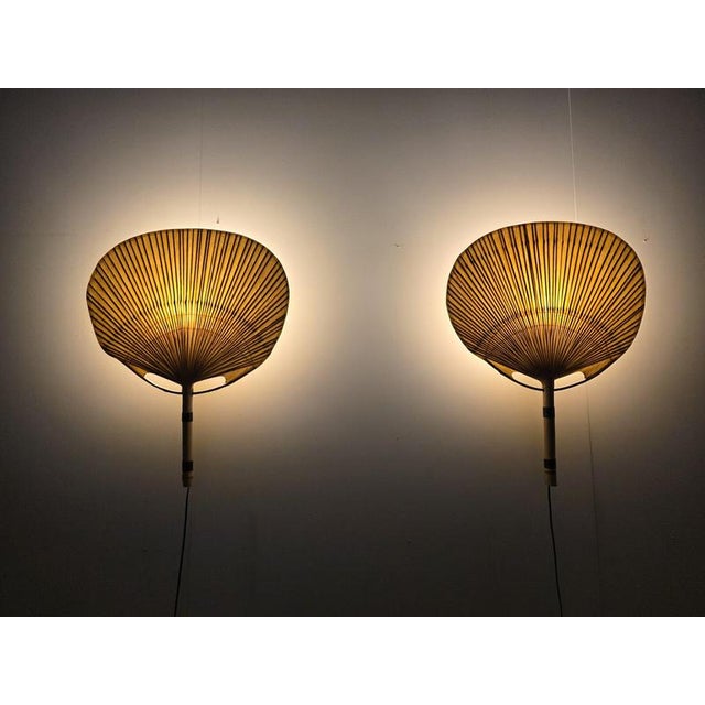 A pair of uchiwa iii wall lights by ingo maurer for design m, 1970s, germany. Inspired by traditional japanese fans....
