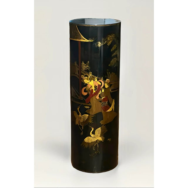 Chinese black lacquered cylindrical wood pedestal, 1960s. Exquisite pedestal with a scene depicting elegant ladies in a...