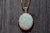 The Sydney Outstanding pendant six (6) prong set with Impressive 11 Carat Fine Australian Opal. Above the Oval shaped...