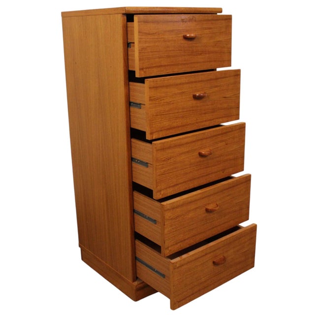This is a Danish made teak lingerie chest. With six drawers it provides ample space. With it's strong lines and subtle...