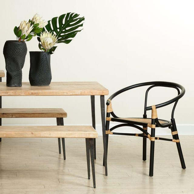 With a casual elegance that's suitable for everyday dining and entertaining, this chair is handcrafted from rattan, a...