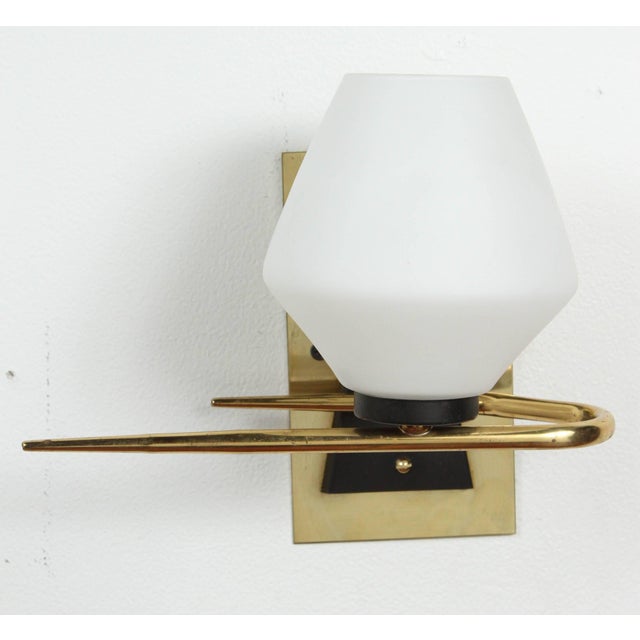Pair of Mid-Century French sconces with original glass shades. A brass plate has been added to the back to cover a US...