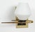 Pair of Mid-Century French sconces with original glass shades. A brass plate has been added to the back to cover a US...