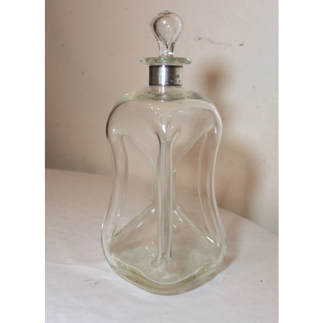 Up for sale is a very high quality antique 19th century sterling and blown glass liquor decanter made in Denmark. This...