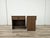 A charming pair of bedside tables dating back to the 1960s, featuring a minimalist and functional design typical of period...