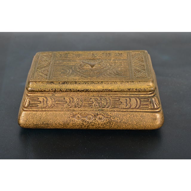A gorgeous antique Arts & Crafts or Art Deco period gilt bronze "American Indian" pattern stamp box By Tiffany Studios...