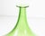 A Murano art glass vase. Made in Italy, this vase has a slender neck with green top and wide purple lower half. The...
