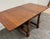 This is a stunning vintage Early American, Colonial Revival, Jacobean, or William and Mary style walnut dining table...