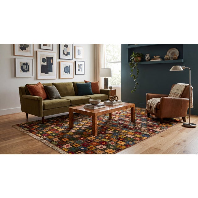 Bring vibrant, artistic energy into your space with this stunning modern Baluch style wool rug. Handcrafted featuring a...