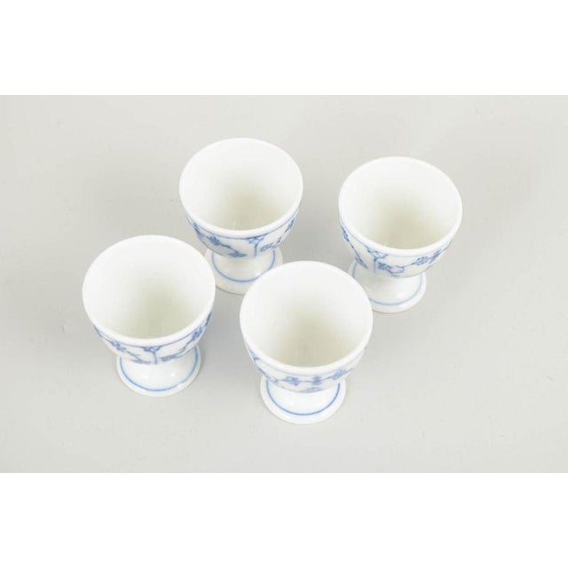 Royal Copenhagen Blue Fluted Plain egg cups, set of 4, 1920s. Set of four classic egg cups in Blue Fluted Plain, made in...
