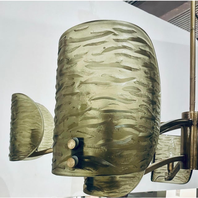Original retail $3615, stylish Arteriors Modern Textured Smoked Glass Natasha Chandelier, satin brass frame, showroom...