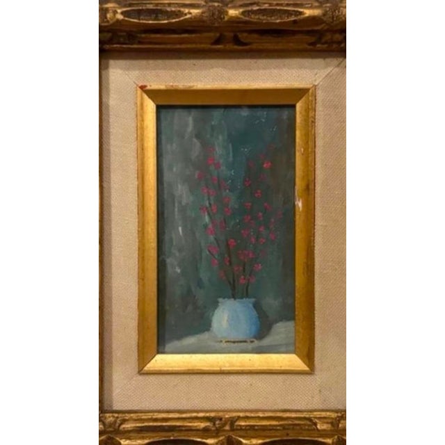 19c Antique hand carved gilded frame accented with a small floral center oil painting. Sizing of art is 3x8 frame size is...