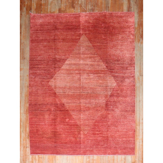 One of a kind intermediate size Persian Gabbeh rug from the late 20th century featuring a large irregular shape soft color...