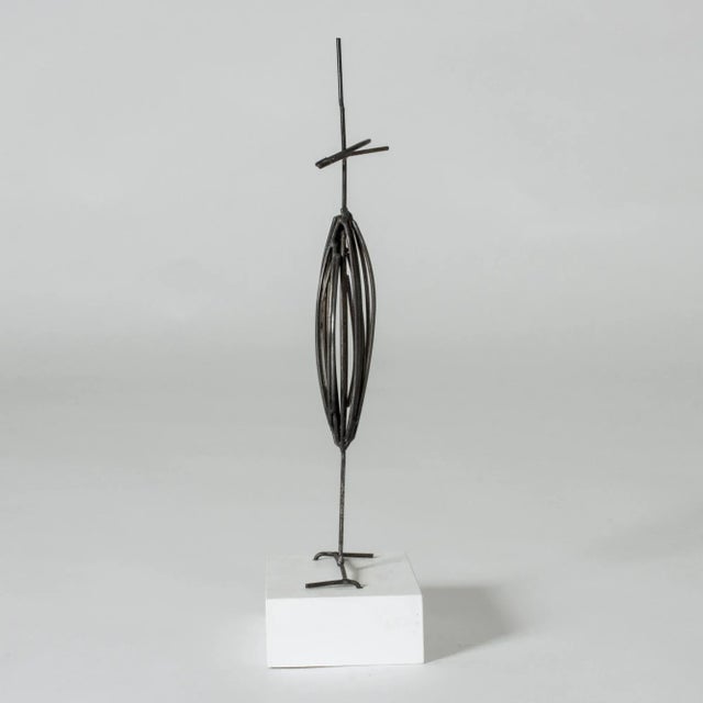 Sculpture made from iron by Fred Leyman. The iron wire has been sensitively shaped into an enigmatic figure that can be...