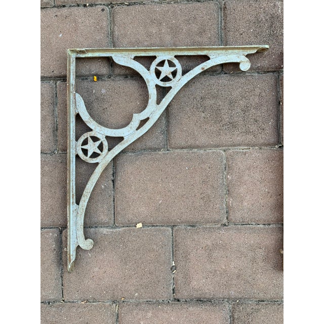 Vintage pair of sturdy, great quality, metal shelf brackets. Measure 15” D x 17”H.