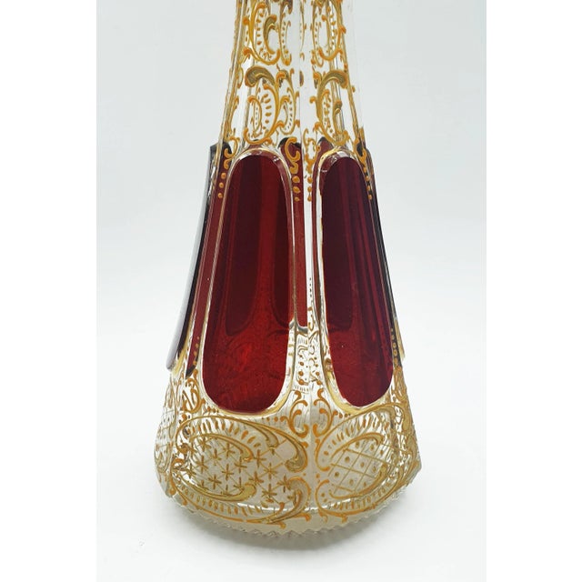 19th century Moser Cabochon ruby glass champagne glasses / flutes covered in 24k gold. Set of 6 glasses and a decanter.