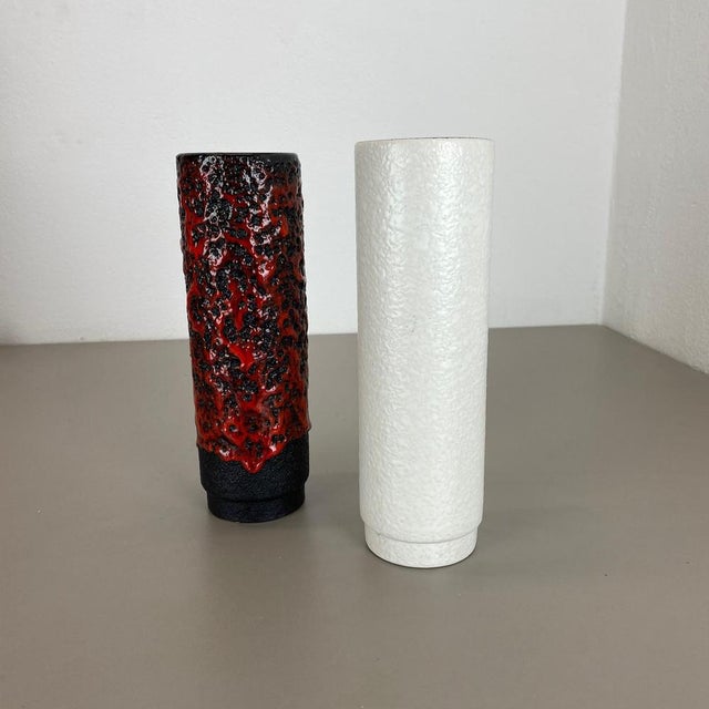 Article: Set of two fat lava art vases Producer: Jopeko Ceramics, Germany Decade: 1970s These original vintage vases was...