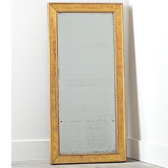A dazzling French mirror from circa 1840 with the potential to brighten up any room and across many decorating tastes...