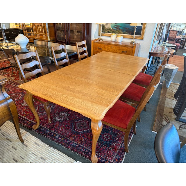 Design Plus Gallery presents Extension Dining Room Table in the Queen Anne Style. The table is made of oak wood with a...