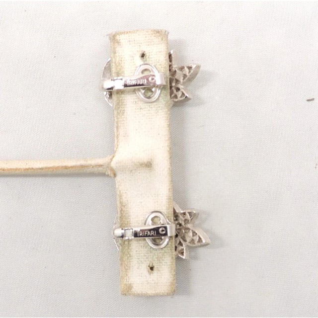 Metal Vintage Signed Crown Trifari Rhodium Plated Clear Rhinestone Flower Clip Earrings - 2 Pieces For Sale - Image 7 of 7