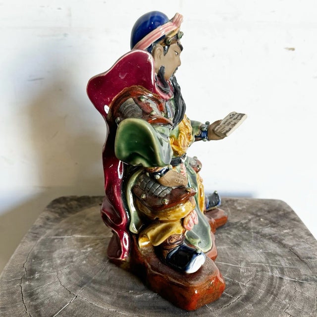 This vintage hand-painted pottery sculpture depicts Guan Gong (Guan Yu), the legendary Chinese general revered as a symbol...