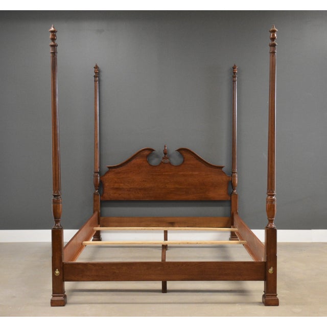 A solid cherry traditional four poster queen size bed. Made in USA. Circa 1980’s. Excellent condition. 65” wide. 89.25”...