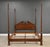 A solid cherry traditional four poster queen size bed. Made in USA. Circa 1980’s. Excellent condition. 65” wide. 89.25”...