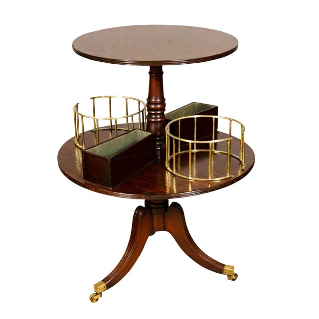 Circular with a lower conforming wider shelf all on a turned columnar post, with brass gallery plate holders and a pair of...