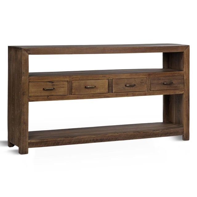Farmhouse style reclaimed wood console table with four drawers and two open shelving spaces for additional storage and...