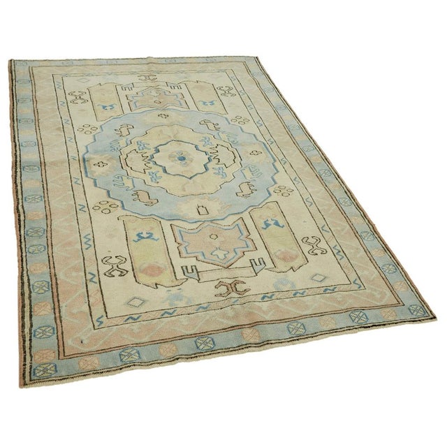 This Turkish handmade Anatolian rug is a timeless piece of craftsmanship, created in the heart of Anatolia, Turkey, a...