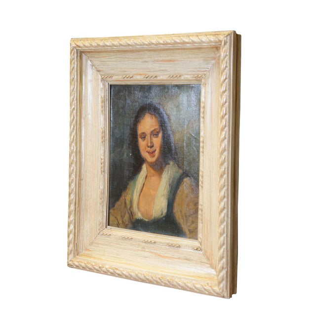 Early 20th century oil on canvas painting after Frans Hals' work known as "The Gypsy Girl." Depicts a young peasant woman...