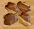 Rustic vintage set of four leaf shaped carved monkey pod wood bowls or trays. Mid-Century Hawaiian decor and serving...