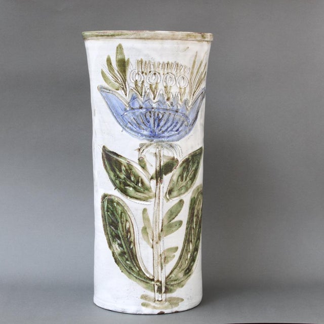 Mid-century decorative tall vase by Albert Thiry (circa 1960s). A gentle creamy-white glaze encompasses the exterior of...