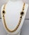 American Vintage 1988 Signed Napier Goldtone Cabochon Faux-Onyx Sautoir Necklace For Sale - Image 3 of 8