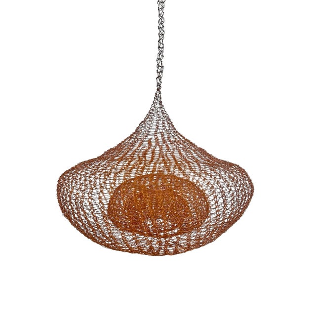 Handmade hanging copper wire sculpture inspired by Ruth Asawa