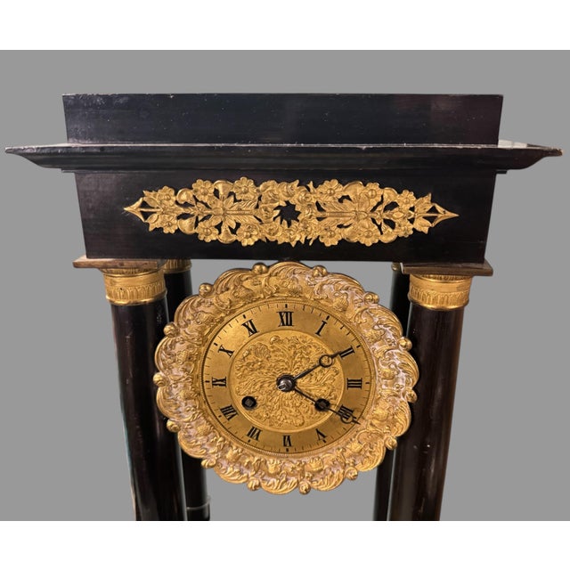 A large & impressive 19" Antique French Empire Ebonized & Ormolu Decorated Portico Mantel Clock In good original condition...