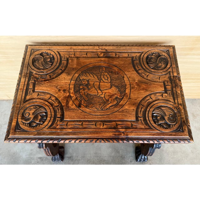 Side table of walnut with carved lyre legs with carved top with horse and cavaliers and so carved edges in top. Beautiful...